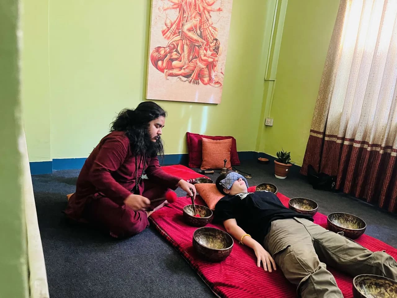 Singing bowl therapy session at the centre